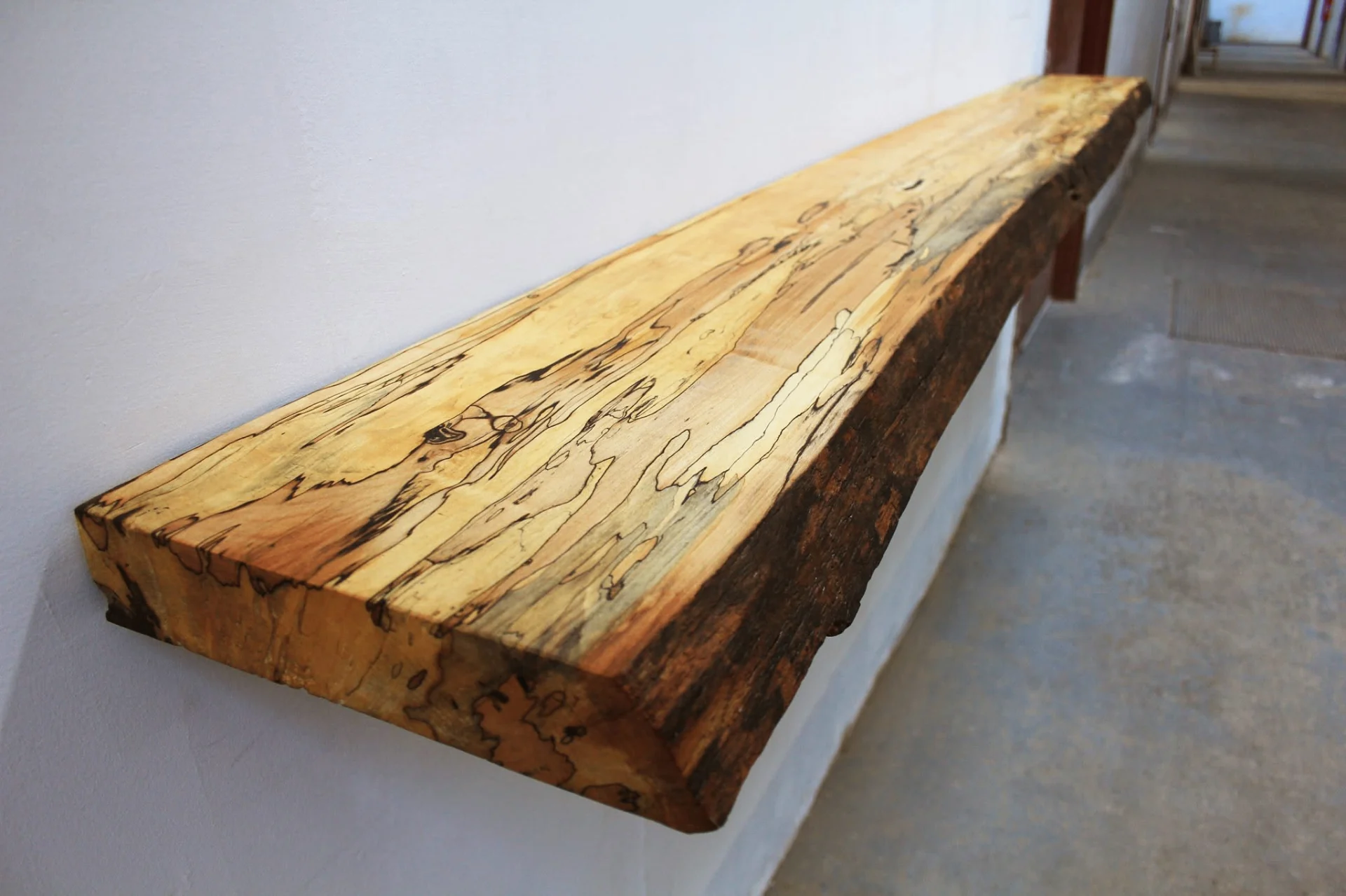Spalted maple live-edge floating shelf, installed