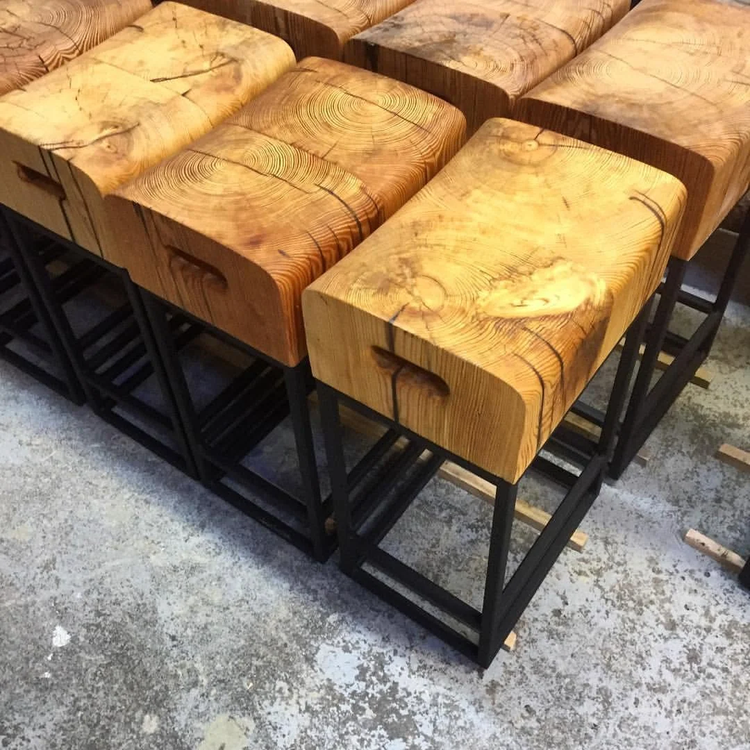 Finished run of reclaimed timber block bar stools — Barsa Taberna, 2013